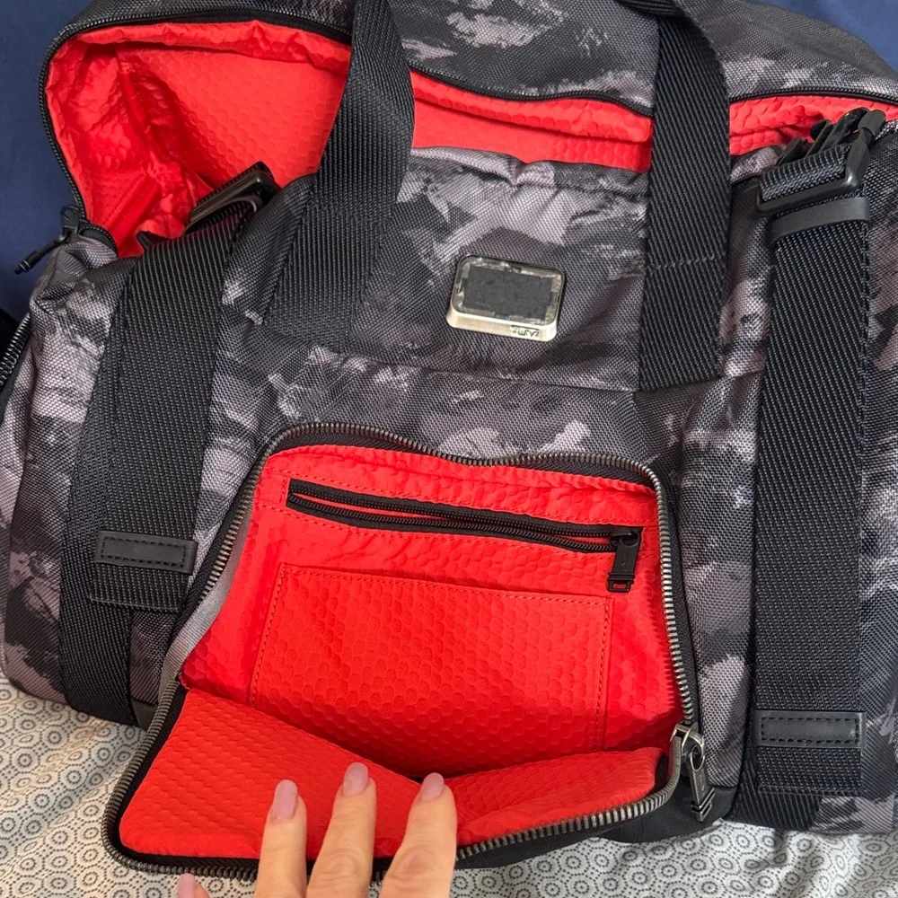 Tumi Black Camo Duffel Bag with Red Interior